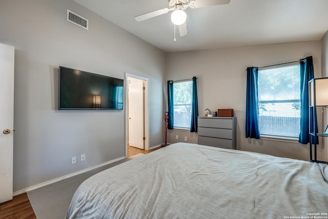 9406 Gillcross, San Antonio, TX 78250 - bedroom with wood finished floors and a ceiling fan
