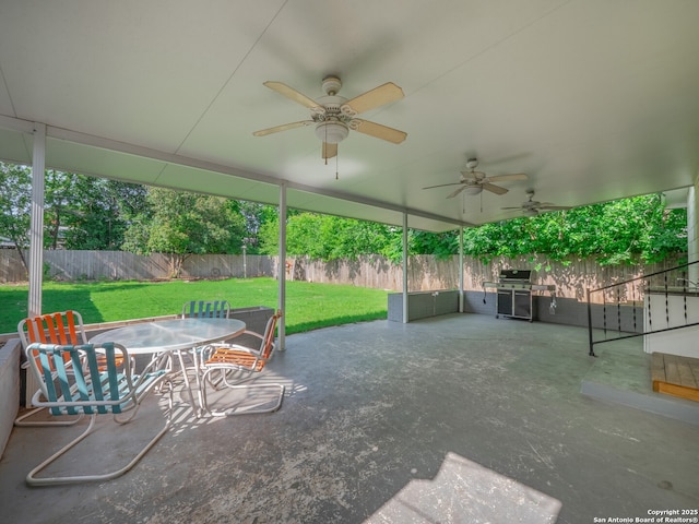 110 W Hermine Blvd, San Antonio, TX 78212 - fenced backyard featuring a patio, a ceiling fan, outdoor dining area, and area for grilling