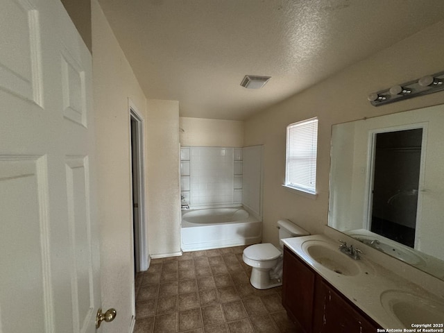 6547 Estes Flts, San Antonio, TX 78242 - full bath featuring double vanity, tile patterned floors, shower / bathtub combination, and a textured ceiling
