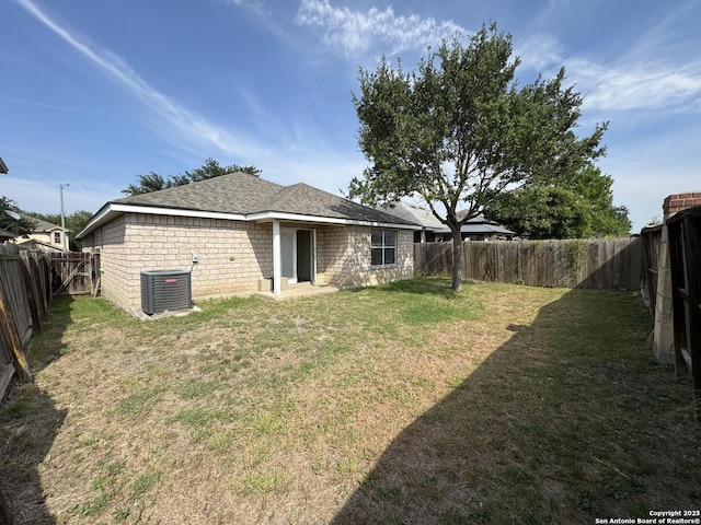 6547 Estes Flts, San Antonio, TX 78242 - rear view of property with a fenced backyard and roof with shingles