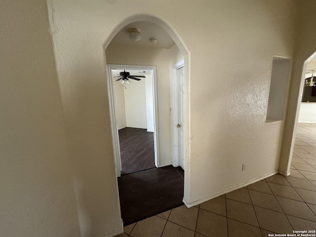 6547 Estes Flts, San Antonio, TX 78242 - hall featuring arched walkways and tile patterned floors