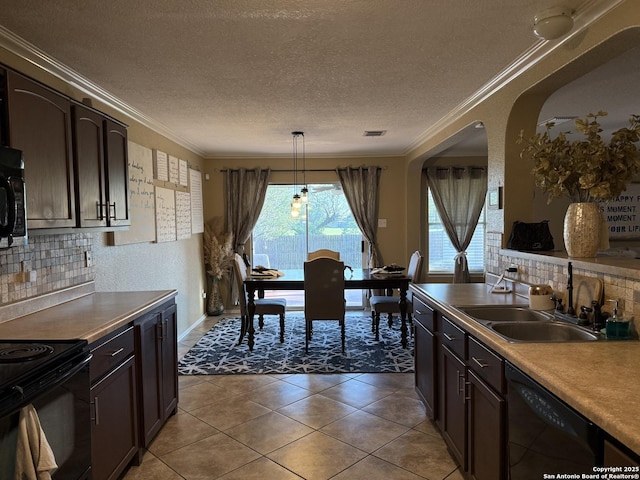 6922 Lunar, Converse, TX 78109 - kitchen featuring black appliances, decorative backsplash, light tile patterned floors, a textured ceiling, and decorative light fixtures