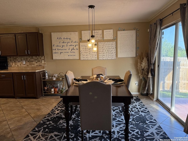 6922 Lunar, Converse, TX 78109 - dining room featuring light tile patterned floors and ornamental molding