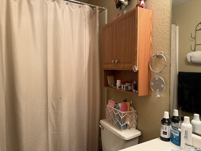 6922 Lunar, Converse, TX 78109 - full bathroom featuring a textured wall and a shower with shower curtain