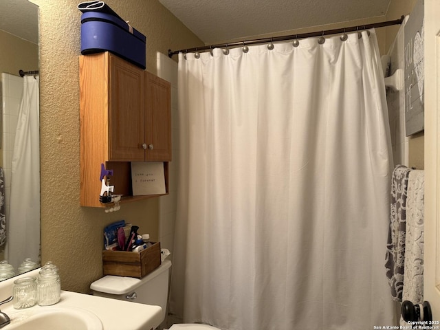 6922 Lunar, Converse, TX 78109 - bathroom with a textured wall, a textured ceiling, vanity, and curtained shower