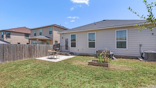 6314 Hibiscus Fls, San Antonio, TX 78218 - back of house with a patio area and a garden