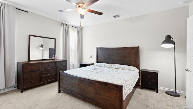 6314 Hibiscus Fls, San Antonio, TX 78218 - bedroom with light colored carpet and ceiling fan