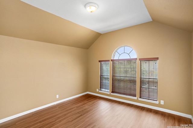 3415 Highline, San Antonio, TX 78261 - unfurnished room with wood finished floors and lofted ceiling