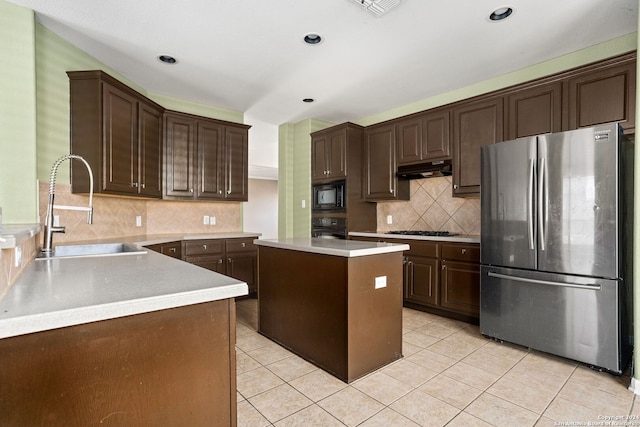 3415 Highline, San Antonio, TX 78261 - kitchen with black appliances, light tile patterned floors, light countertops, dark brown cabinetry, and recessed lighting