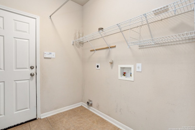 3415 Highline, San Antonio, TX 78261 - laundry area with electric dryer hookup, gas dryer hookup, hookup for a washing machine, and light tile patterned flooring