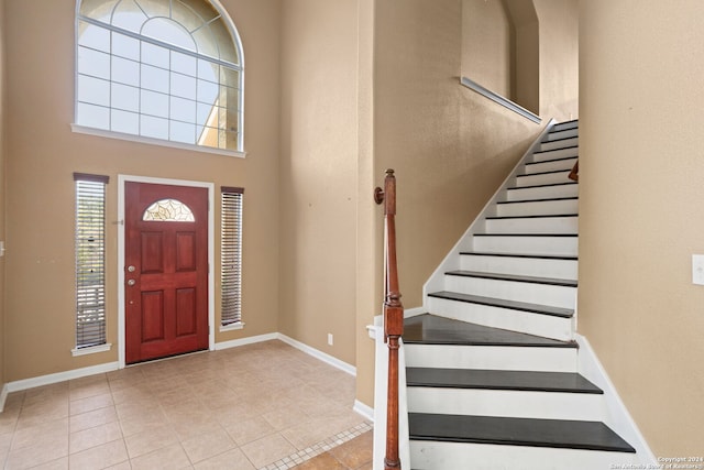 3415 Highline, San Antonio, TX 78261 - foyer with stairs, tile patterned floors, and a towering ceiling