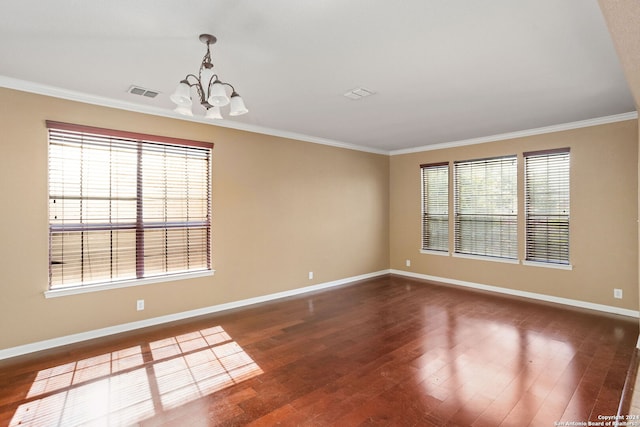 3415 Highline, San Antonio, TX 78261 - spare room featuring dark wood-type flooring, ornamental molding, and a chandelier