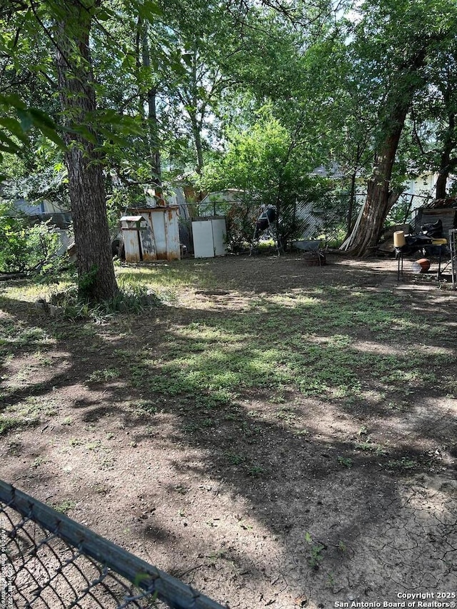 227 Noria St, San Antonio, TX 78207 - view of yard featuring a storage shed