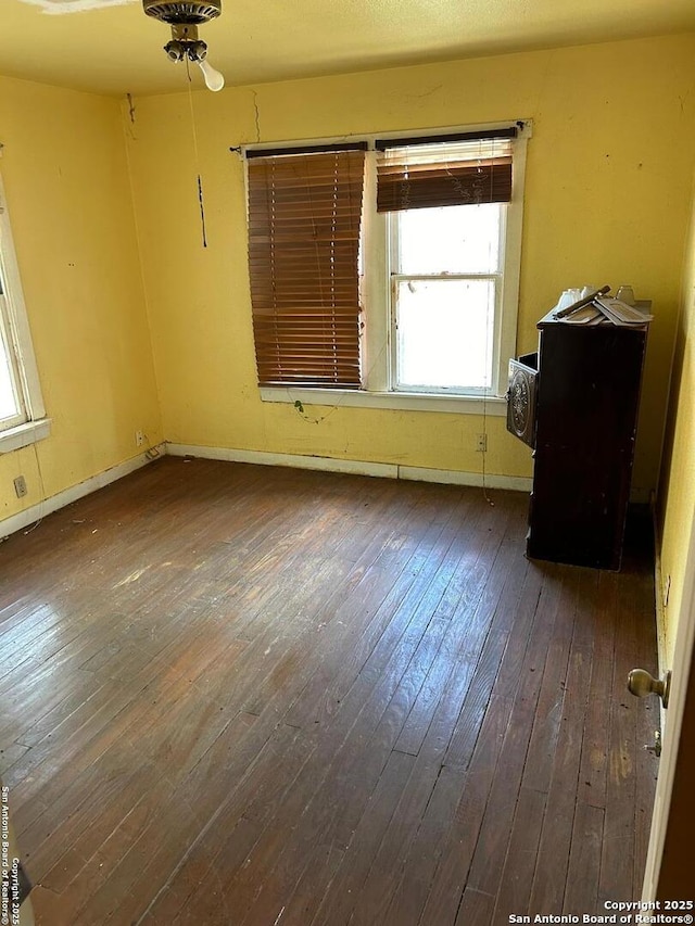 227 Noria St, San Antonio, TX 78207 - unfurnished room featuring wood-type flooring and baseboards