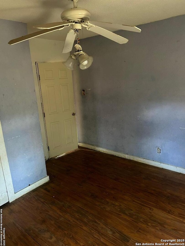 227 Noria St, San Antonio, TX 78207 - empty room with a ceiling fan and wood finished floors