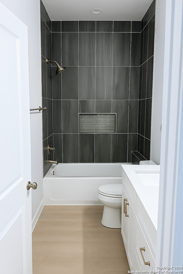 455 S Hackberry, New Braunfels, TX 78130 - bathroom featuring vanity, wood finished floors, and washtub / shower combination