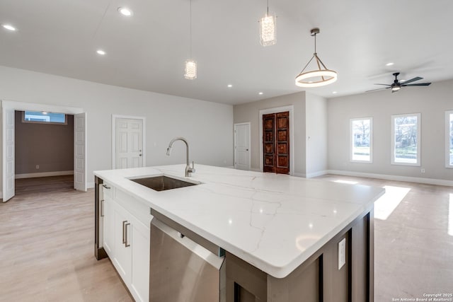 455 S Hackberry, New Braunfels, TX 78130 - kitchen featuring dishwasher, an island with sink, light stone counters, plenty of natural light, and recessed lighting
