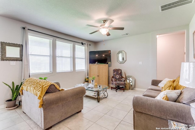 6723 Dashmoor, San Antonio, TX 78244 - living area with ceiling fan and light tile patterned floors