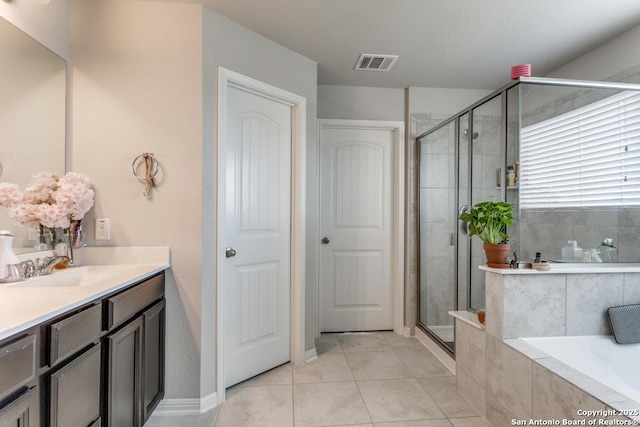 6723 Dashmoor, San Antonio, TX 78244 - full bath featuring vanity, a bath, a stall shower, and tile patterned flooring