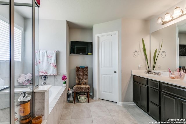 6723 Dashmoor, San Antonio, TX 78244 - bathroom featuring double vanity, a garden tub, and tile patterned flooring