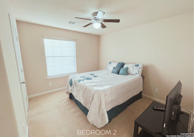 4018 Matson Mnr, Converse, TX 78109 - carpeted bedroom with baseboards and a ceiling fan