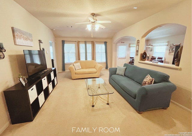 4018 Matson Mnr, Converse, TX 78109 - living area featuring carpet floors, ceiling fan, and arched walkways