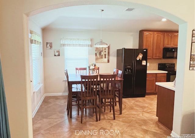 4018 Matson Mnr, Converse, TX 78109 - dining space featuring arched walkways and recessed lighting