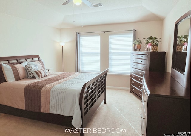 4018 Matson Mnr, Converse, TX 78109 - bedroom with light colored carpet, ceiling fan, and a tray ceiling