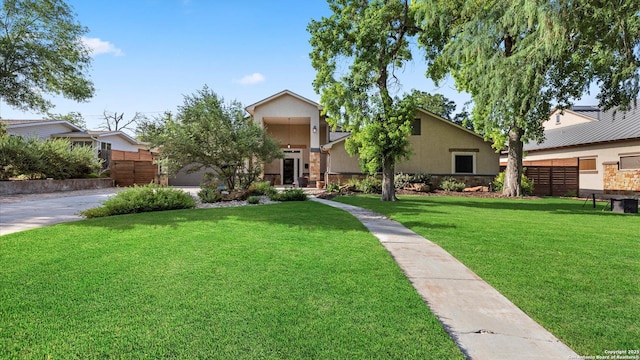 1069 Ivy Ln, Terrell Hills, TX 78209 - view of front facade with stucco siding and a front yard
