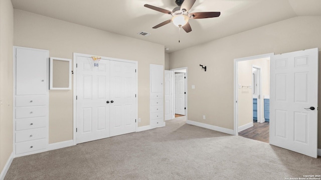 1069 Ivy Ln, Terrell Hills, TX 78209 - unfurnished bedroom featuring carpet floors, connected bathroom, a closet, and a ceiling fan