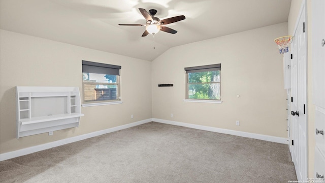 1069 Ivy Ln, Terrell Hills, TX 78209 - spare room with ceiling fan, carpet flooring, healthy amount of natural light, and vaulted ceiling