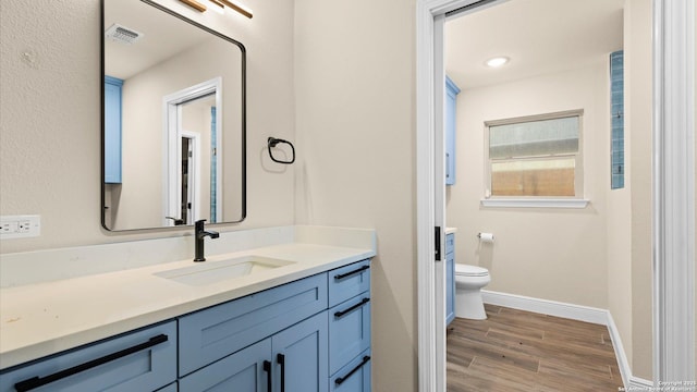1069 Ivy Ln, Terrell Hills, TX 78209 - bathroom with vanity and wood finished floors