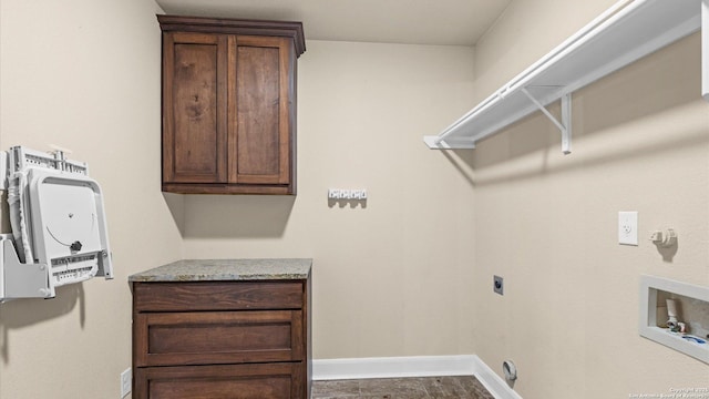 1069 Ivy Ln, Terrell Hills, TX 78209 - washroom with cabinet space, hookup for an electric dryer, and hookup for a washing machine