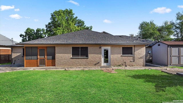 1069 Ivy Ln, Terrell Hills, TX 78209 - back of house featuring brick siding, a storage shed, and a lawn