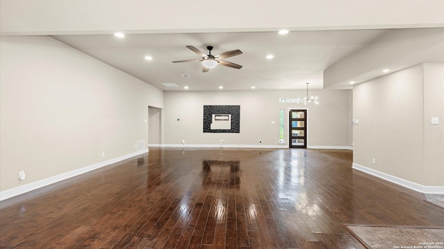 1069 Ivy Ln, Terrell Hills, TX 78209 - unfurnished living room with a ceiling fan, wood-type flooring, recessed lighting, and a chandelier