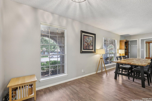 2019 Crooked, San Antonio, TX 78232 - dining area with a textured ceiling and wood finished floors