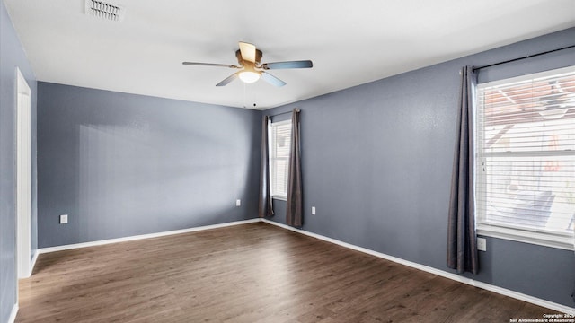 702 Pelican Pt, San Antonio, TX 78221 - unfurnished room featuring a ceiling fan and wood finished floors