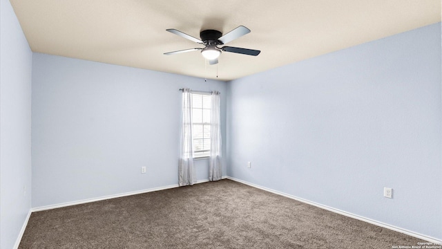 702 Pelican Pt, San Antonio, TX 78221 - spare room with a ceiling fan and dark colored carpet