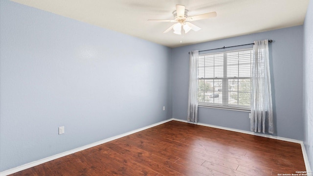 702 Pelican Pt, San Antonio, TX 78221 - spare room with a ceiling fan and wood finished floors