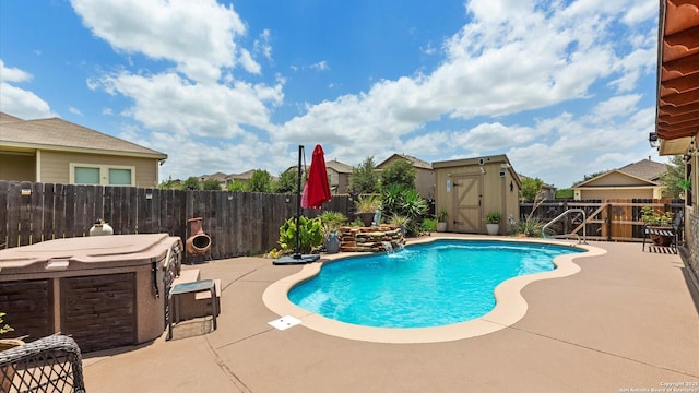 702 Pelican Pt, San Antonio, TX 78221 - view of swimming pool with a storage shed, a patio, a fenced backyard, and a hot tub