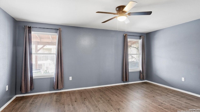 702 Pelican Pt, San Antonio, TX 78221 - spare room featuring wood finished floors, ceiling fan, and plenty of natural light