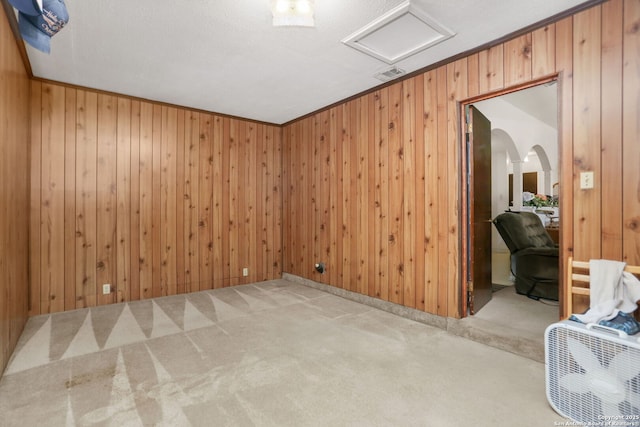 5402 Happiness, Kirby, TX 78219 - carpeted empty room with attic access and wooden walls