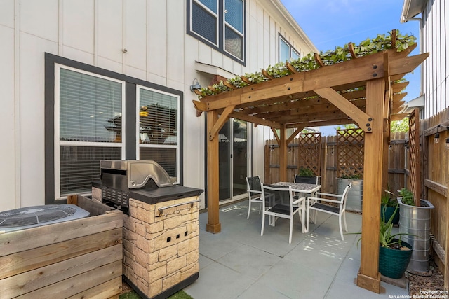 7934 Teak Ln, San Antonio, TX 78209 - view of patio / terrace featuring outdoor dining area, an outdoor kitchen, and a gate
