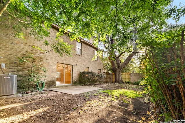 10057 Fall Harvest, San Antonio, TX 78254 - back of property with a patio and brick siding