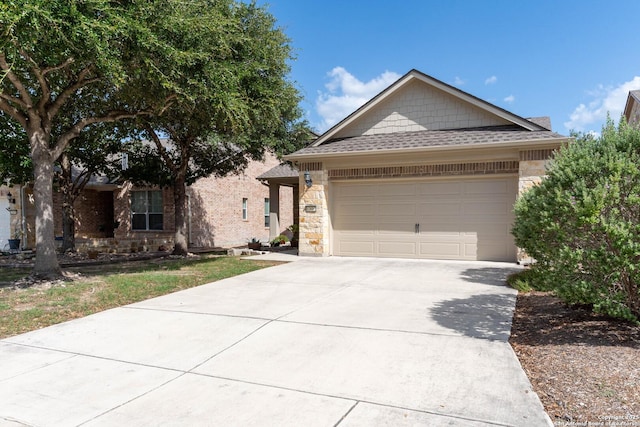 12610 Lotus Rdg, San Antonio, TX 78253 - single story home featuring concrete driveway, roof with shingles, an attached garage, and brick siding
