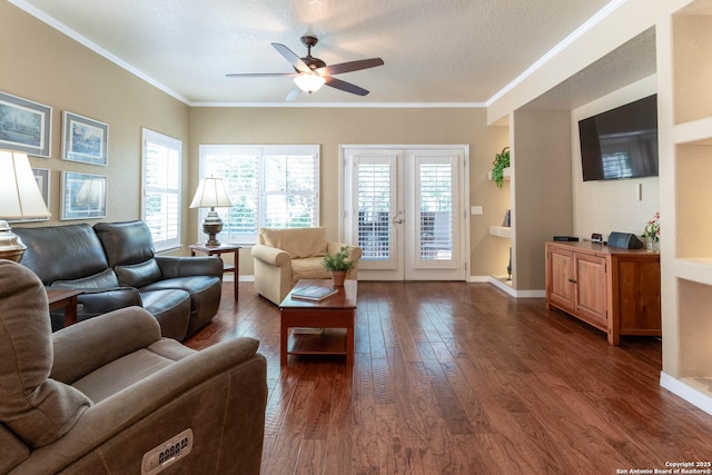 12610 Lotus Rdg, San Antonio, TX 78253 - living area with ornamental molding, a ceiling fan, dark wood-style flooring, a textured ceiling, and french doors