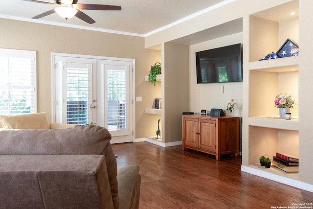 12610 Lotus Rdg, San Antonio, TX 78253 - living room with crown molding, dark wood-style floors, and ceiling fan