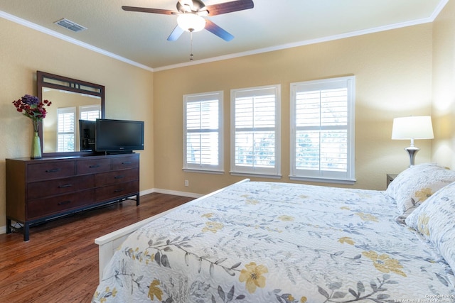 12610 Lotus Rdg, San Antonio, TX 78253 - bedroom featuring dark wood-type flooring, multiple windows, crown molding, and a ceiling fan