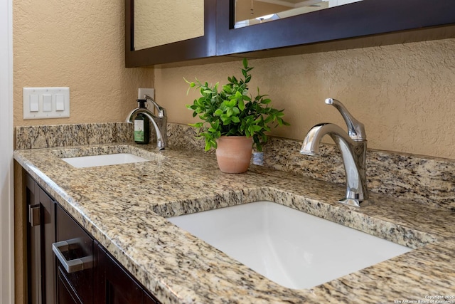 12610 Lotus Rdg, San Antonio, TX 78253 - bathroom view of a textured wall and double vanity