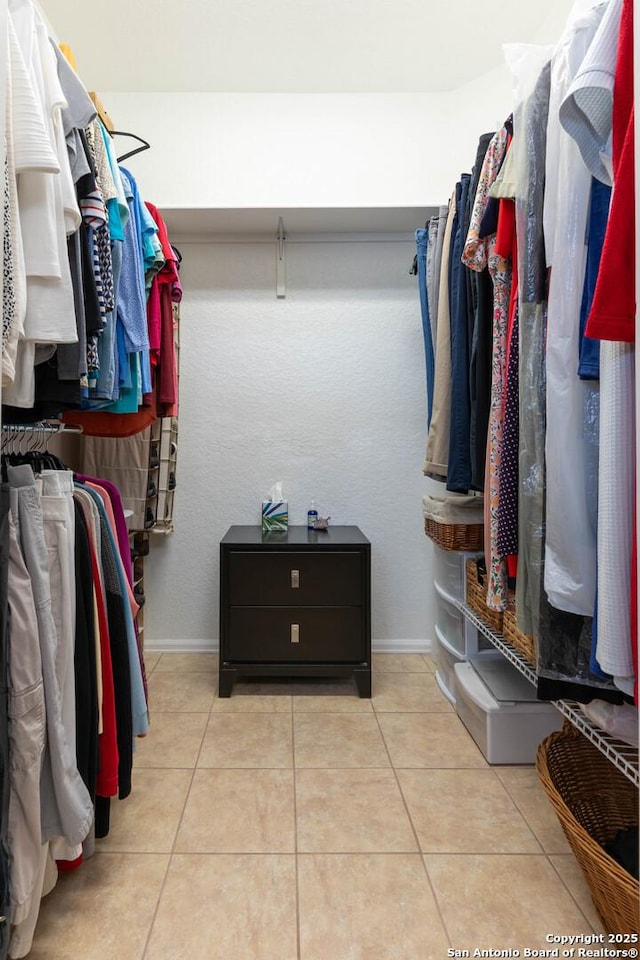 12610 Lotus Rdg, San Antonio, TX 78253 - walk in closet featuring light tile patterned floors
